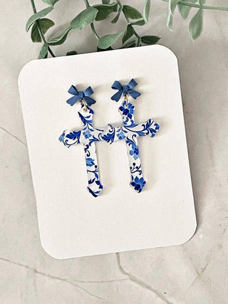 Floral Cross Dangle Earrings: Blue Bow Accent