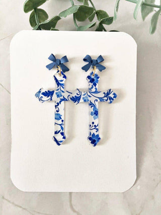 Floral Cross Dangle Earrings: Blue Bow Accent