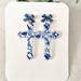 Floral Cross Dangle Earrings: Blue Bow Accent